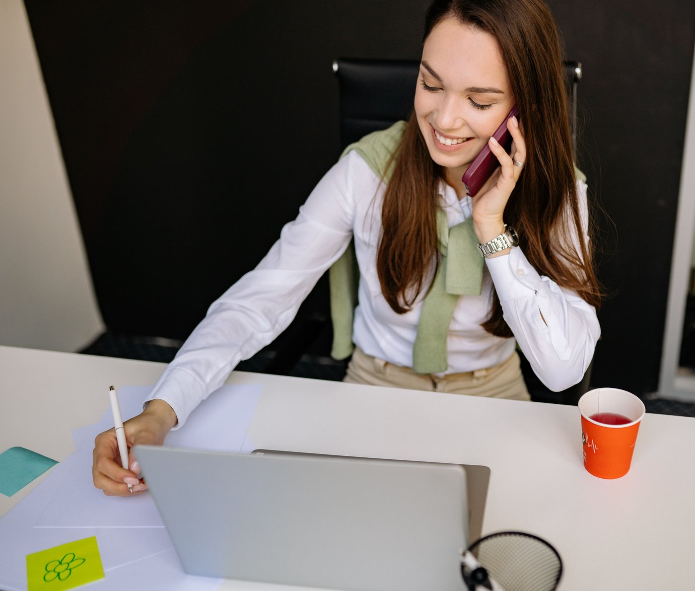 Business owner speaking with a client on the phone