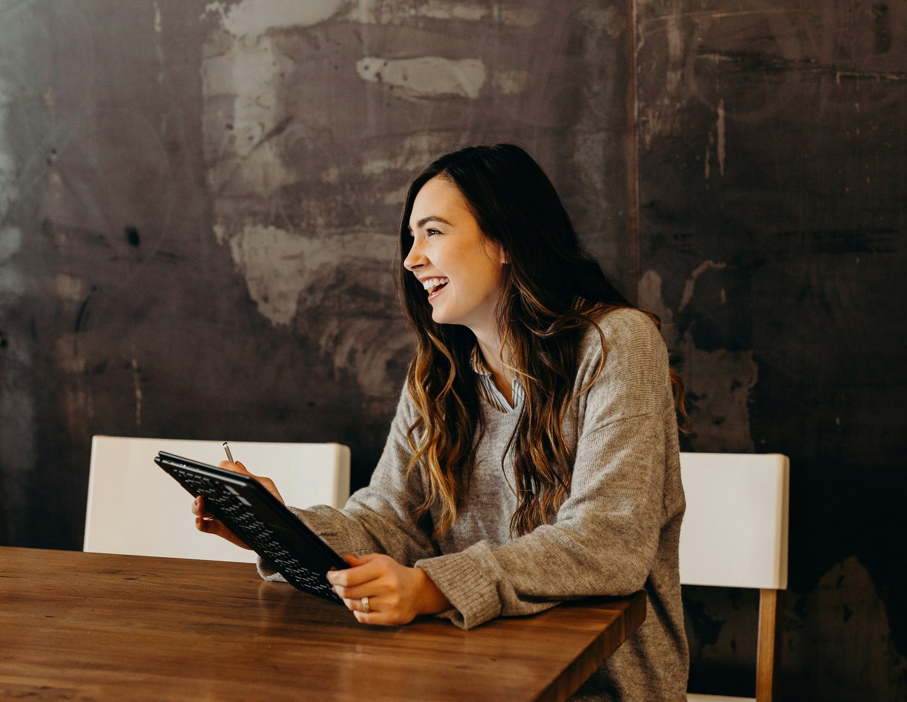 Affinity Asset Finance client reviewing her finance options